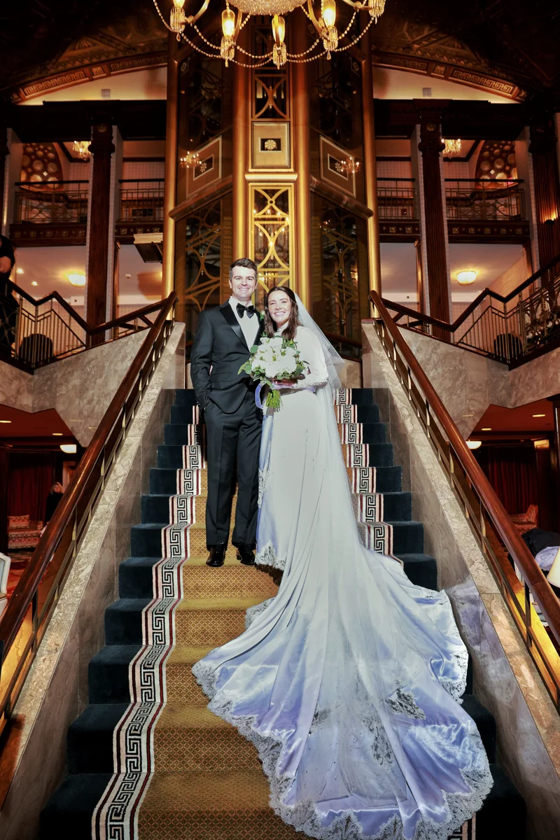 Newlyweds together at their reception venue